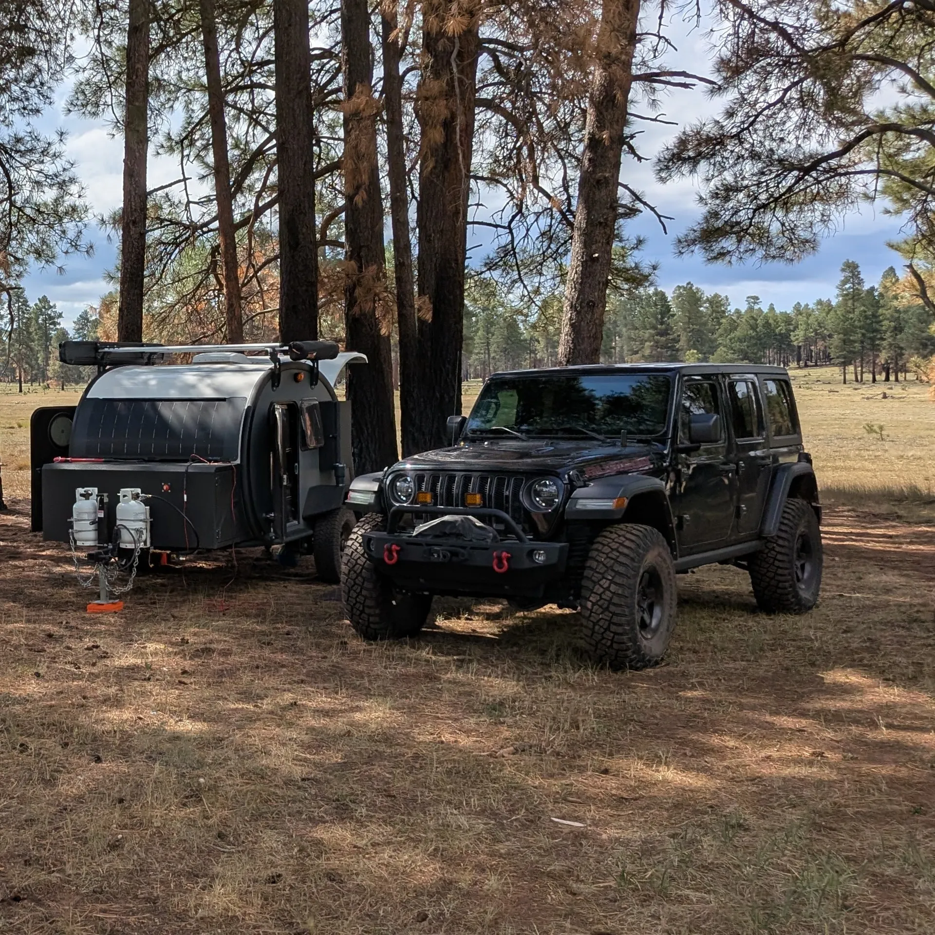 Tents overlooking the mittens in Monument Valley, AZ.